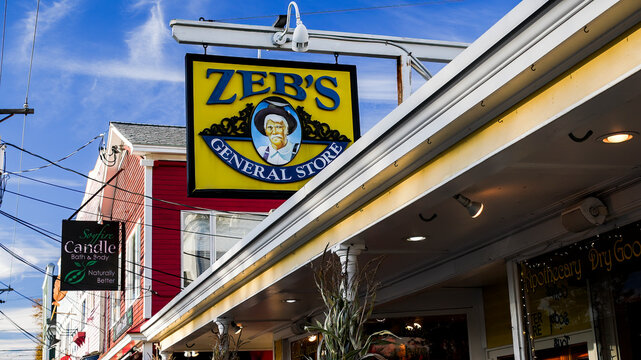 NORTH CONWAY, NEW HAMPSHIRE, USA - OCTOBER 2, 2022: Store signs view from from street in nice autumn afternoon with famous Zebs general store