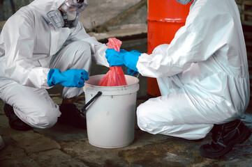 Keep Chemicals in Toxic Waste Red Bag and Thick Plastic Barrels for Disposal, Dispose of Material...