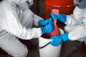 Keep Chemicals in Toxic Waste Red Bag and Thick Plastic Barrels for Disposal, Dispose of Material...