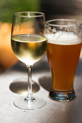 Glass of wine and craft beer glass 