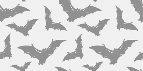Halloween seamless pattern with bats for monochrome halloween design. Wallpaper or background with vampires for october party banner, poster or postcard