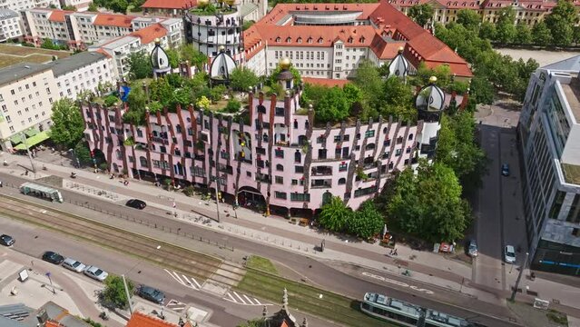Aerial Drone shot of the Green Citadel (Gr&uuml;ne Zitadelle) by Friedensreich Hundertwassers in Magdeburg city, Saxony-Anhalt, Germany .