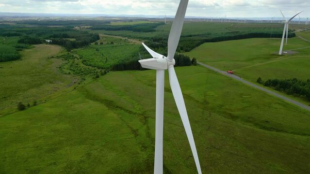 Aerial drone footage of wind turbines in South Lanarkshire, Scotland, UK