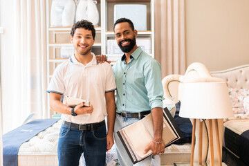 Sales team looks at the camera and smiles at a neighborhood store.
