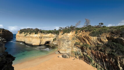 Western cliffs and beach at the bottom of Loch Ard Gorge seen from Shipwreck Walk. Port Campbell NP-Australia-823