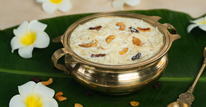 Kerala festival special sweets dessert semiya payasam or kheer payasam arranged in traditional uruli, Onam sadhya special image