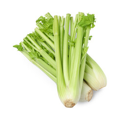 Obraz premium Fresh green celery bunches isolated on white, top view