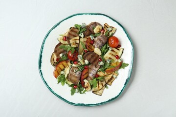 Delicious salad with beef tongue, grilled vegetables, peach and blue cheese on white table, top view