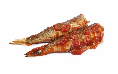 Tasty canned sprats with tomato sauce isolated on white
