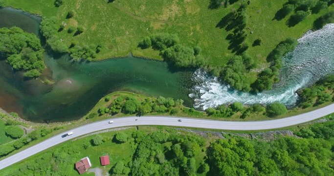 Top Down Aerial Drone View of a River Snaking through a town in Norway (Stryn)