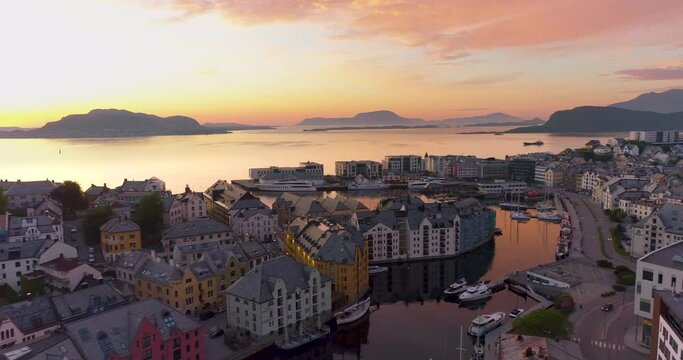 Aerial Drone View of Port City Alesund Norway at Sunset with Boats