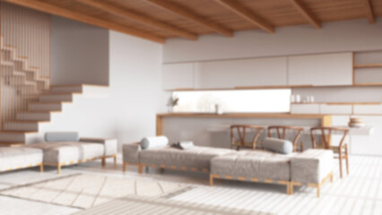 Blurred background, wooden japandi living room and kitchen with resin floor and beams ceilings. Sofas and carpets, island with chairs. Minimal interior design