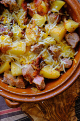 potatoes with meat and cheese