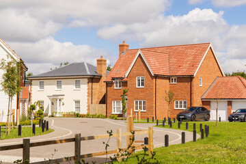 New detached houses in a quiet road. UK