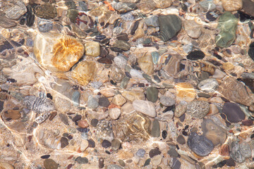 Rocks at the beach in Algajola Village in Corsica