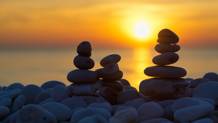 Great view with sunset and pebbles on the beach
