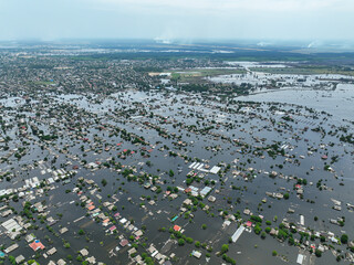 The flooded streets of the city of Kherson after the explosion of the dam of the Kakhovka reservoir. Ecological catastrophe in Ukraine. Russian-Ukrainian war. Exclusive drone footage