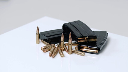 Cartridges are ready to charge the store. Reloading ammunition. Special military operation
