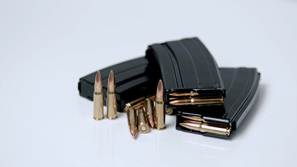 Cartridges are ready to charge the store. Reloading ammunition. Special military operation