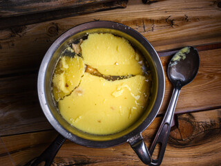 Yellow layer of fat in pot