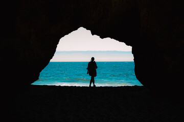Cave Silhouette at Beach
