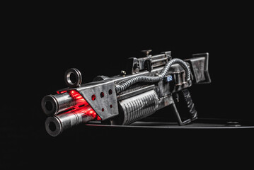 Post apocalyptic style pump action shotgun on the dark background.
