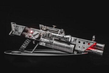 Post apocalyptic style pump action shotgun on the dark background.