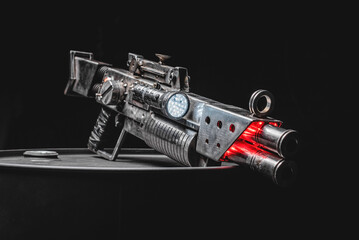 Post apocalyptic style pump action shotgun on the dark background.