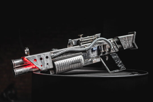 Post apocalyptic style pump action shotgun on the dark background.