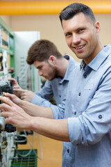 electrical engineer posing and smiling