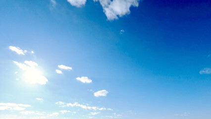 Fototapeta na wymiar beautiful large clouds in the blue sky backdrop - photo of nature