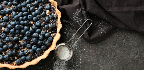 Delicious blueberry pie on dark background. Banner for design - obrazy, fototapety, plakaty