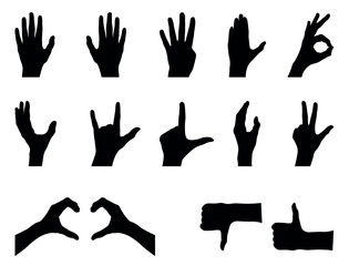 set of silhouettes of hands. different silhouette poses of hand gestures.