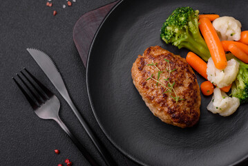 Delicious fresh fried minced fish cutlets with spices and herbs