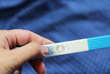 Positive pregnancy test with two stripes