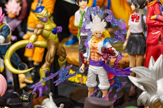 GUAYAQUIL, ECUADOR - AUG 06, 2023 - One Piece and Dragon Ball action figures at Comic Con. Pop culture collectibles. 