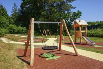 playground area for children. new play park with swings and slides for kids