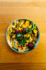 Vegan falafel bowl is a delicious dish easy to make and rich in calories . High quality photo