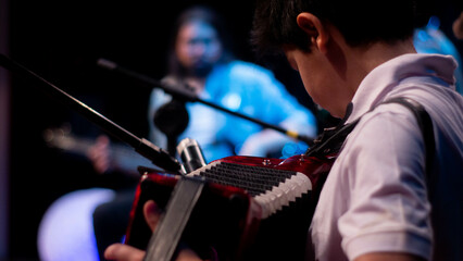 playing accordion orchestra music perfomance 

