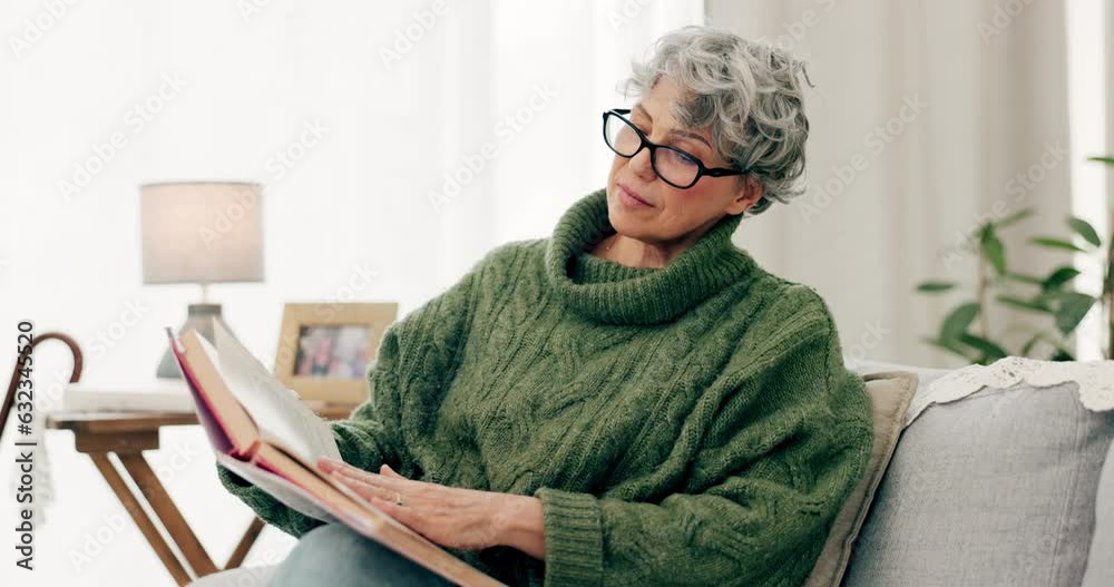 Poster Woman reading funny book in living room for story, novel and knowledge in retirement. Happy senior female person relax with books in lounge for break, literature and hobby to enjoy on sofa at home