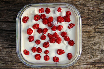 dessert, curd cheese with japanese grape berry in a bowl