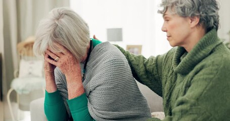 Empathy, sad and senior woman crying for loss, grief or depression in living room at home. Mental health, emotions and elderly female person comfort her friend in cancer sympathy at retirement house