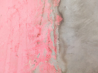 Meeting between pink and gray walls. Pink and gray walls. Cement. Abstract color gradient
