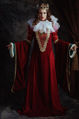 Full length portrait of medieval queen in red dress