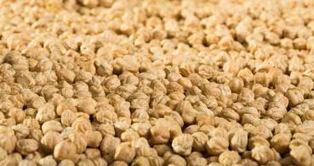 Dried chickpea seeds texture. Natural food background..