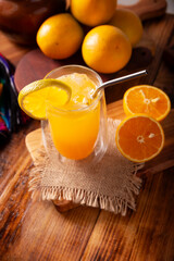 Refreshing homemade orangeade, a natural hydrating drink made from orange juice, very popular in...