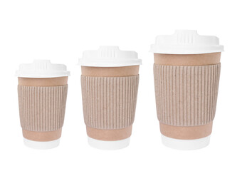 To-go drink. Set with three paper coffee cups of different sizes isolated on white