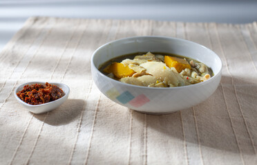 Bamboo shoots and chilli paste on a white cup