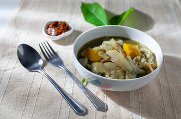 Bamboo shoots and chilli paste on a white cup