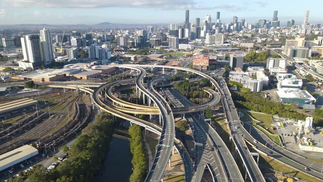 Aerial drone view of the Bowens Hill Interchange in Bowen Hills, Brisbane, Queensland Australia showing Brisbane City cbd in the background 